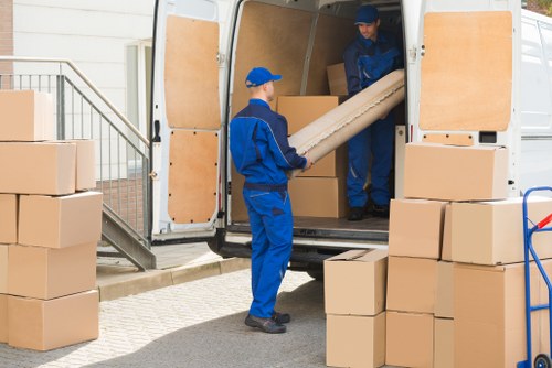 Packed moving boxes prepared for a home move in Catford
