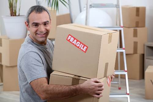 Furniture removals team handling bulky household items in Catford
