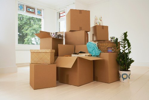 Careful unloading of household items into a Catford flat