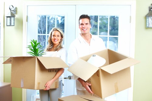 Mover handling furniture carefully during a man and van job